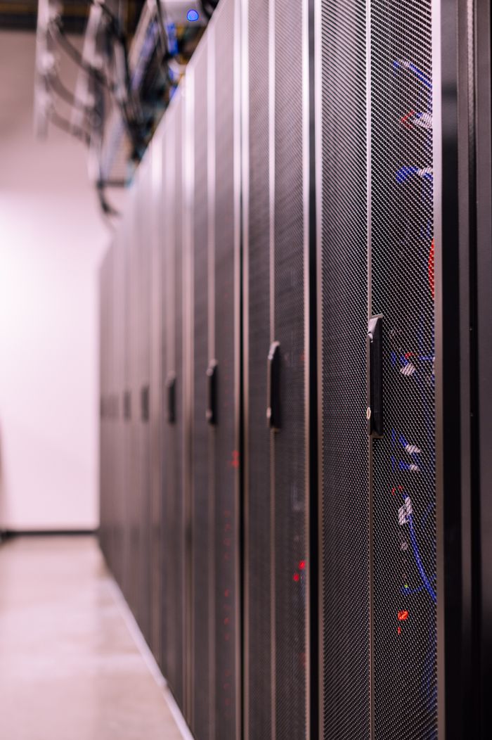 Crafting Captivating Headlines: Your awesome post title goes here Row of similar lockers with various optic fiber cables in modern data server room